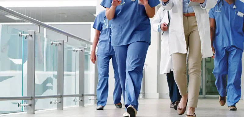 Doctors and nurses walking
