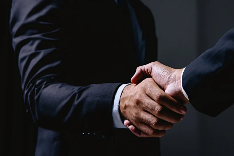 A handshake between two businessmen