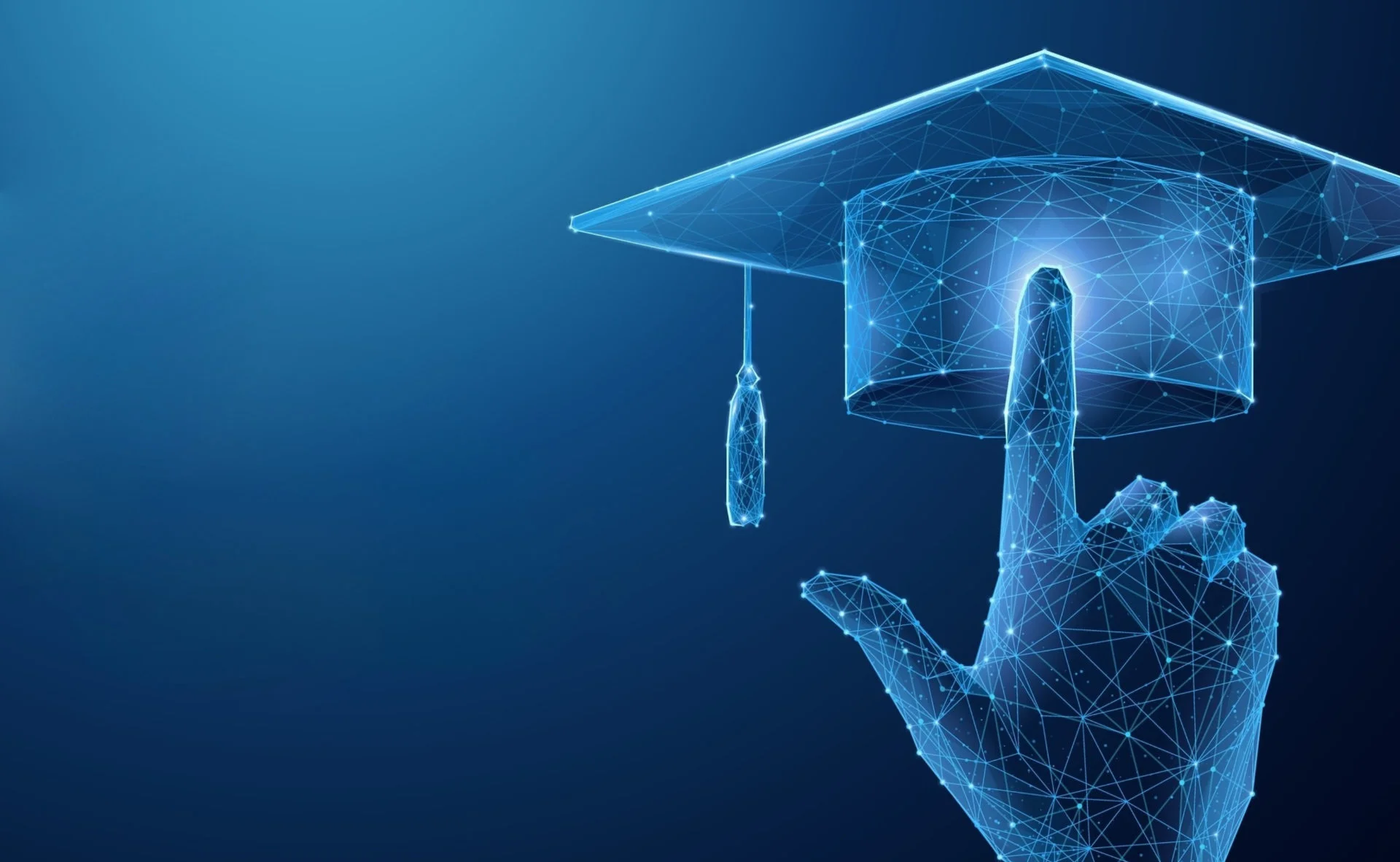 A hand touch a graduation cap